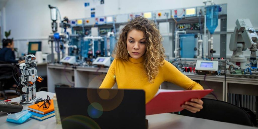 woman in workroom shopping online