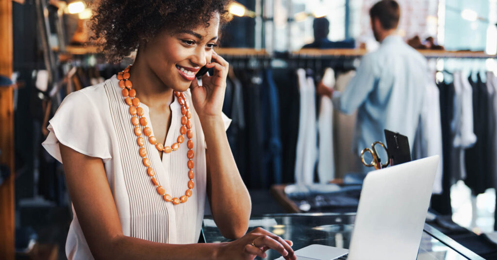 female employee checking online stock levels