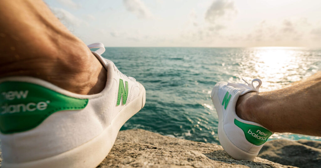 runner relaxing by ocean