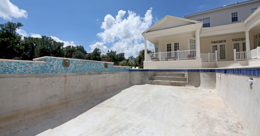 swimming pool under construction on sunny day