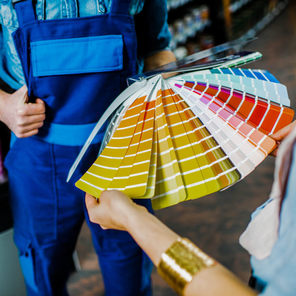 shopper choosing colors for paint mixing