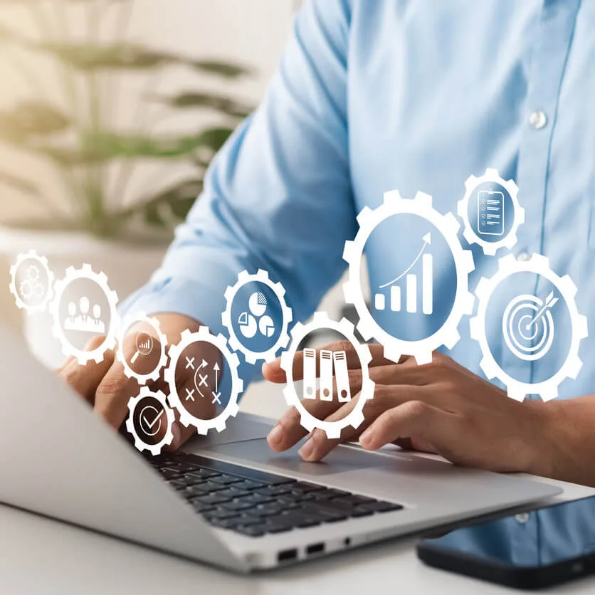 concept of automation with man working at laptop