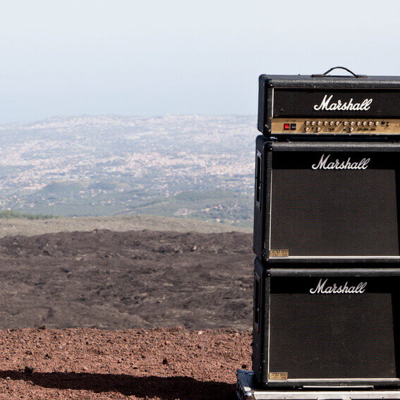 marshall amps piled on top of each other on top of hillside