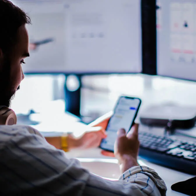 marketing exec managing digital shelf over multiple screens