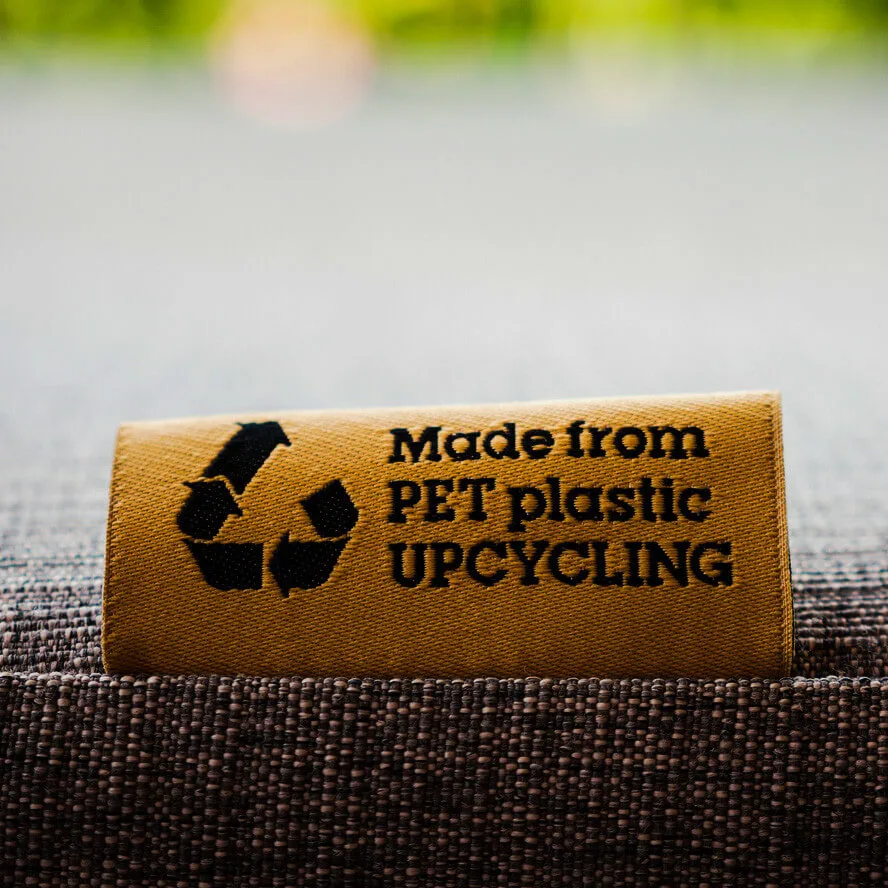furniture label showing product is made with upcycled PET