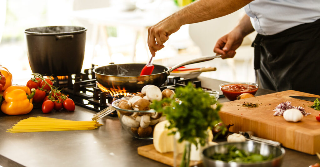 home kitchen with fresh food and stove