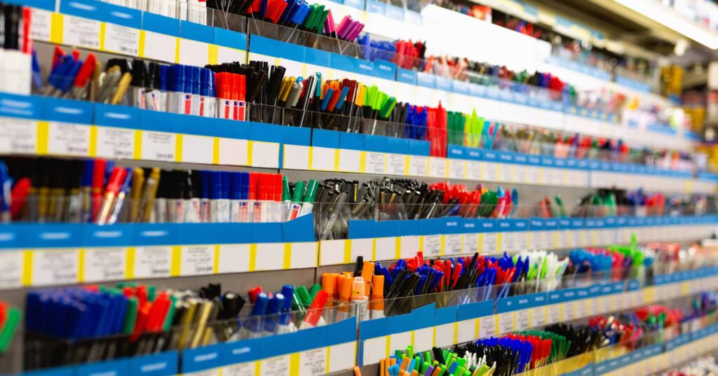 Colorful pen shelves in office supply store