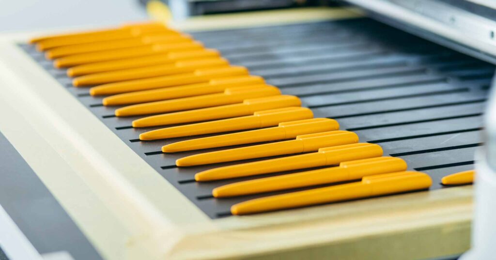 yellow ballpoint pens in production