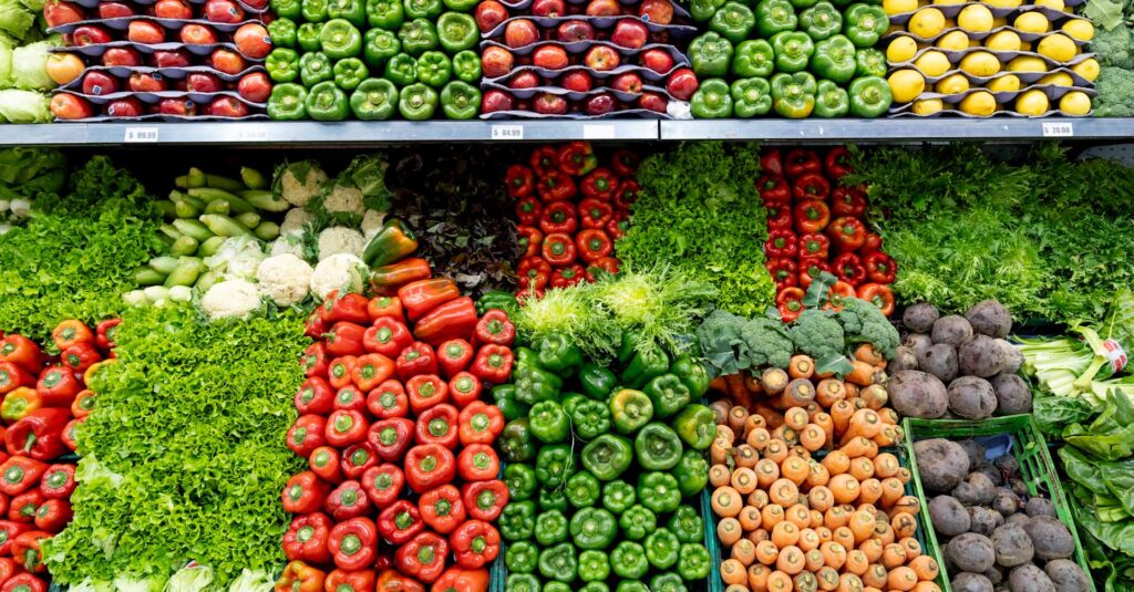 fruit and vegetables in supermarket shelves