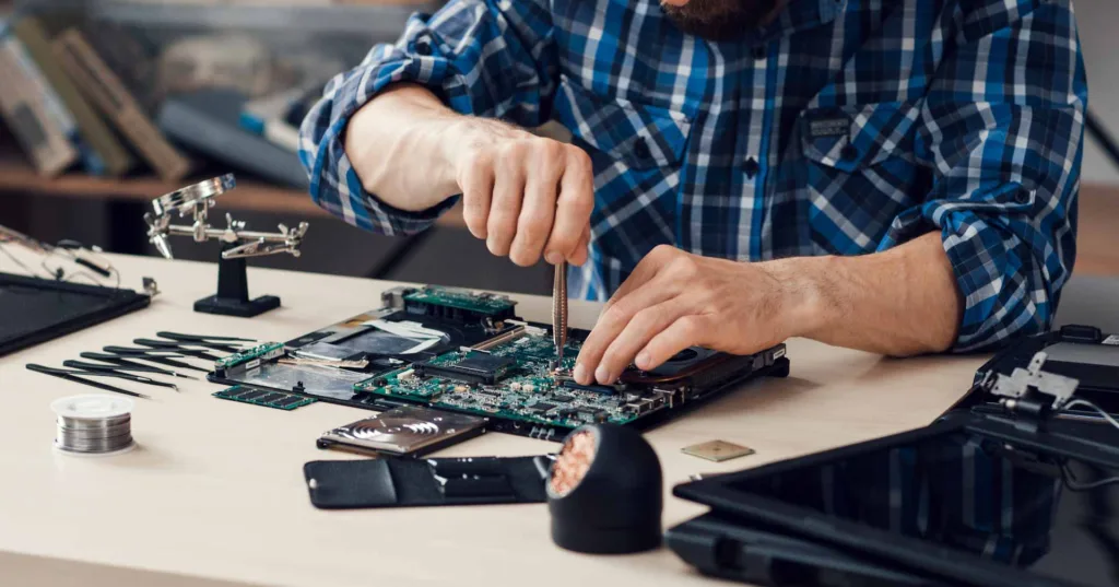 Technician fixing smart phone