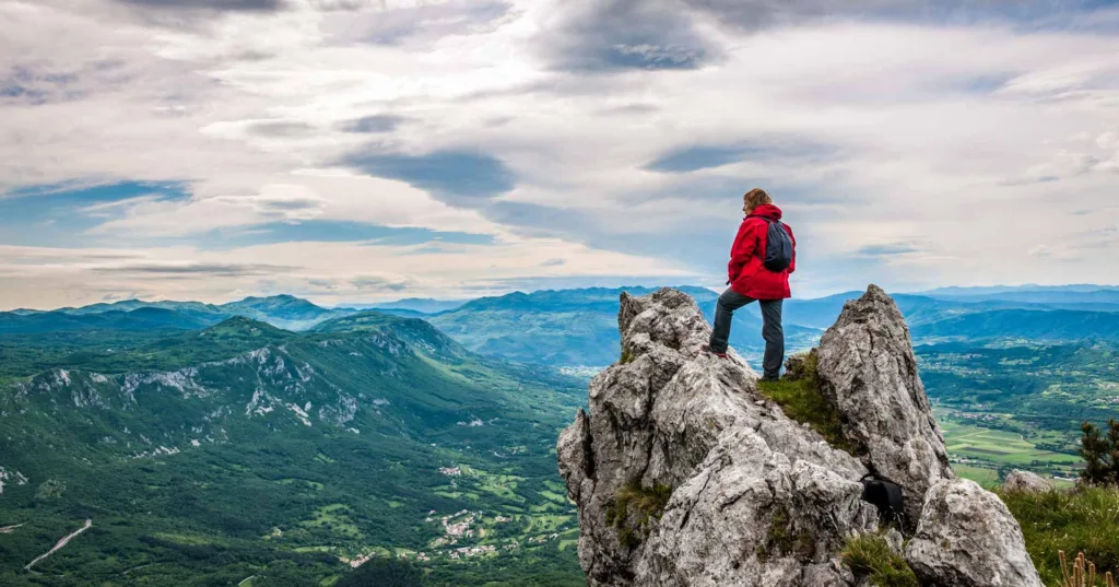 climber on top of mountain